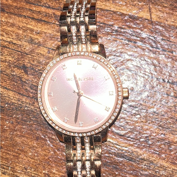 I paid 250$ for it a year ago. From Micheal Kors. - Picture 2 of 3